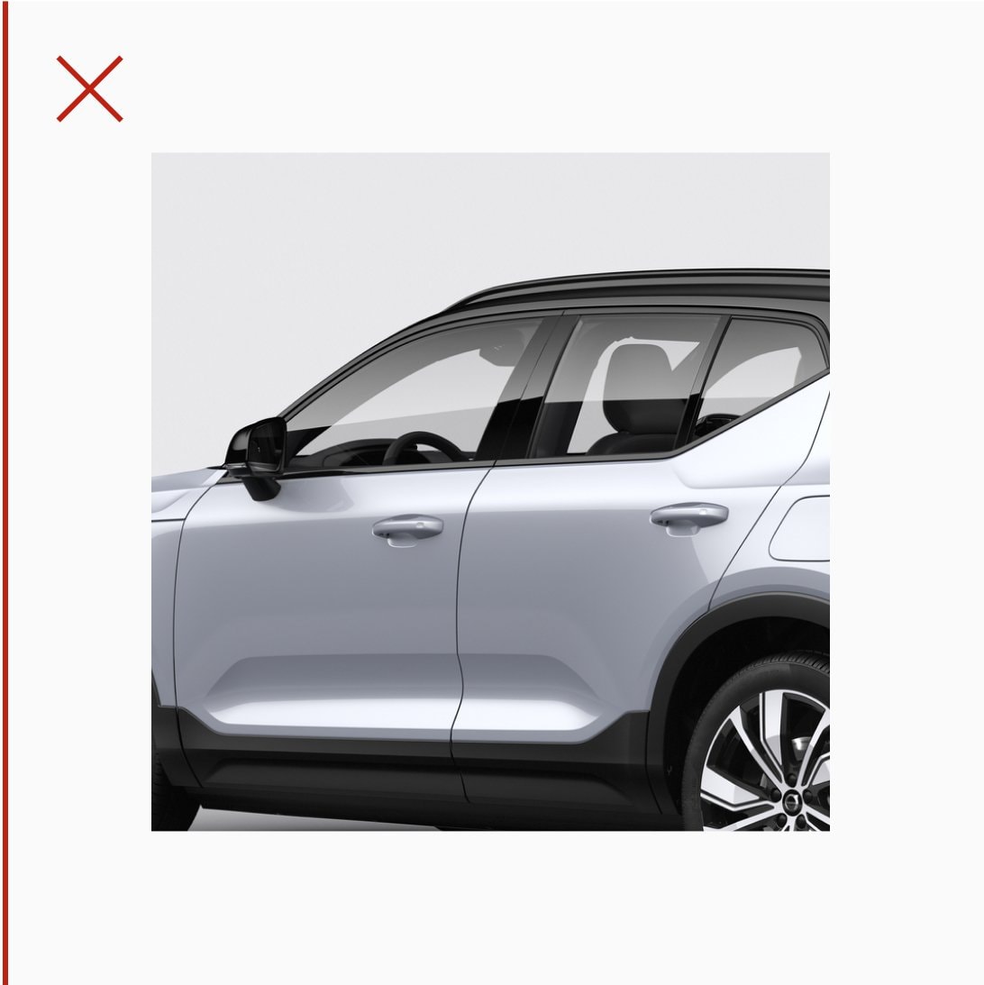 Descriptive image of XC40 facing left. The vehicle has been cropped awkwardly. Avoid this.