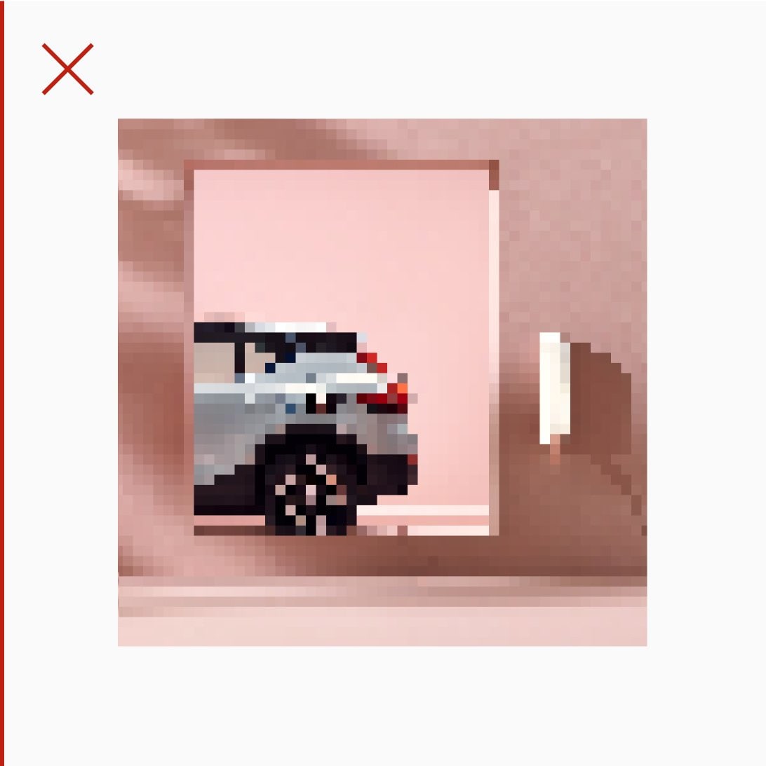 Concept studio image of XC40 in a pink room. The car is only showing the left rear side through a door opening. There is also a charger on the wall which is glowing. This image of blocky and pixelated. Imagery used across Volvo Cars must always be pin-sharp and of a very high resolution. Designers must assess the final quality of their output, especially as it enters technical implementation.