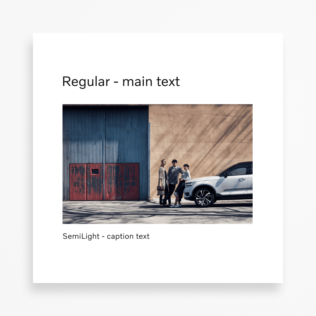 A title, image and caption are all presented together in this visual. The title sits directly above an image of 3 people standing in front of a Volvo XC40 vehicle. Underneath the image a caption text style is shown. It is the smallest of all the text sizes currently shown throughout this page (12 point or 1.5x).