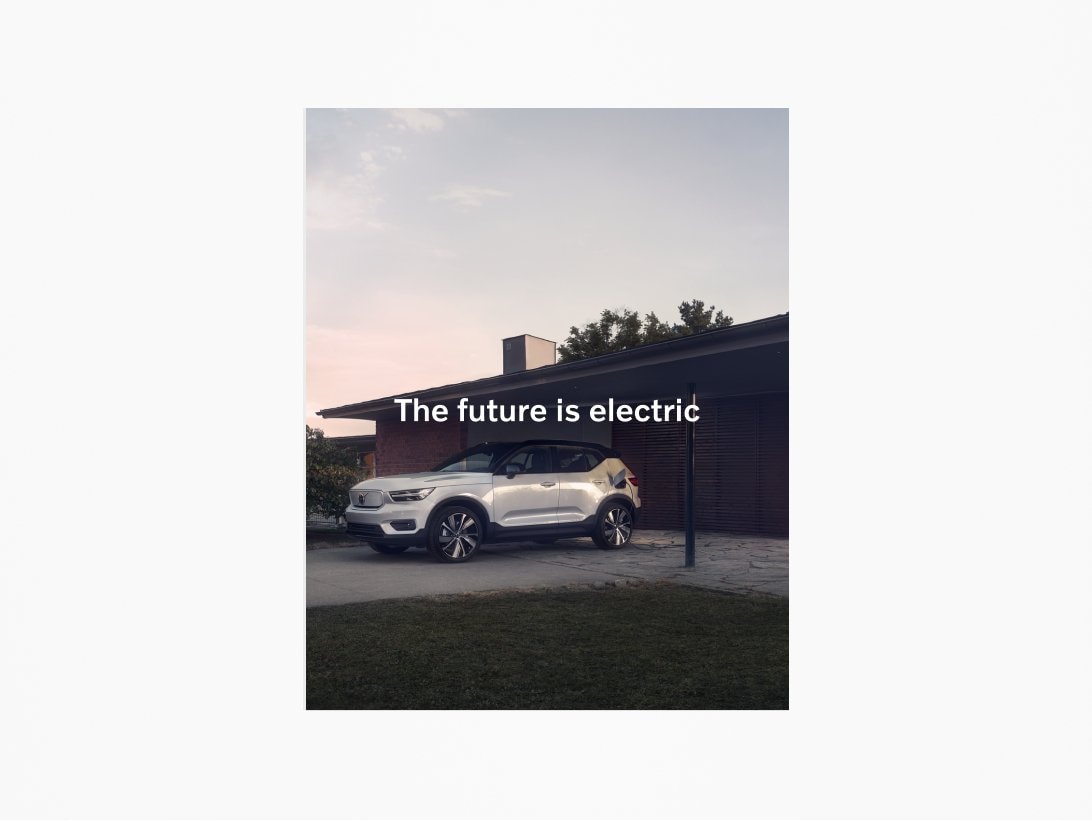 Image of a Volvo XC40 parked on the driveway of a home. White headline overlaid centrally reads: 'The future is electric.'